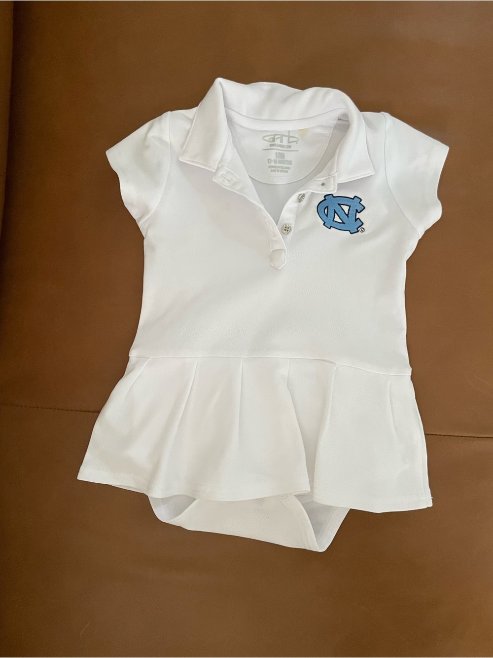 White Girls' UNC Polo Skort Top with Carolina Blue Logo